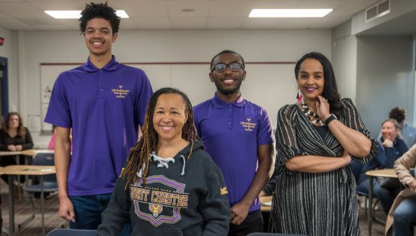 Dean Desha Williams and 3 PRIZE students