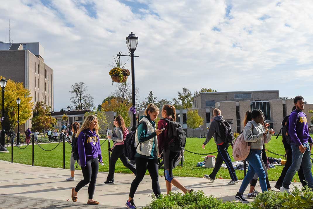 Students walking across Campus