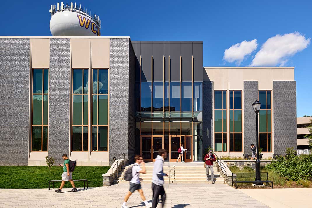 Students walking by the new SECC Building.