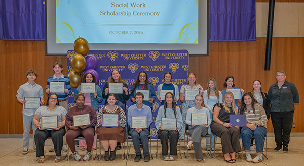 The attending student awardees took a group picture with College of Education and Social Work Interim Dean Hicks.