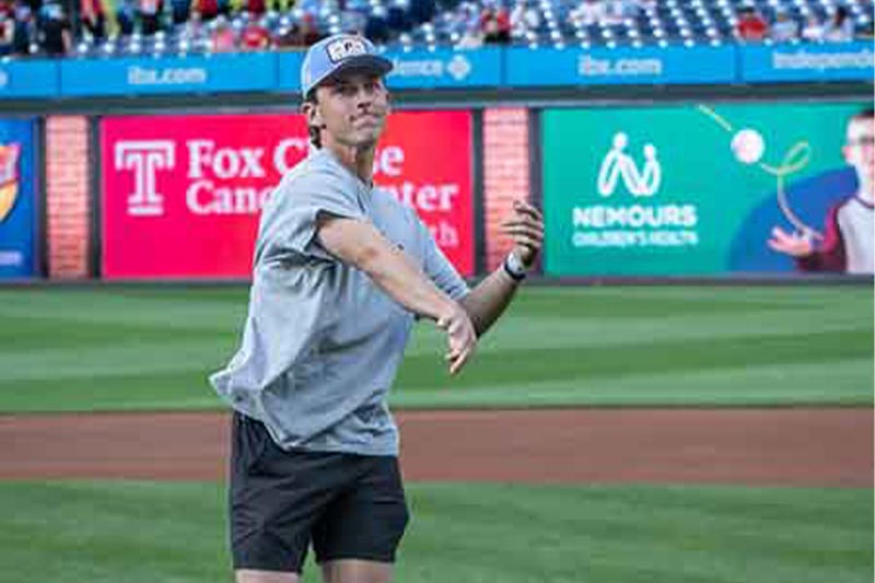 Thumbnail: Jake Welsch throwing the first pitch