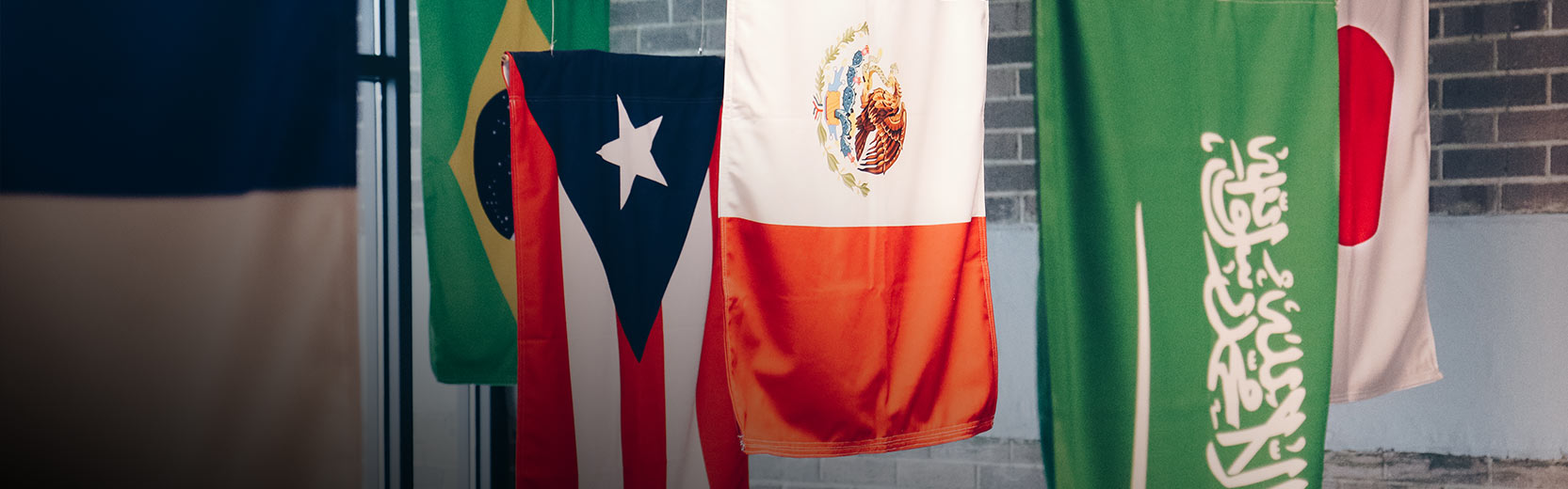 Foreign flags hanging above a stage