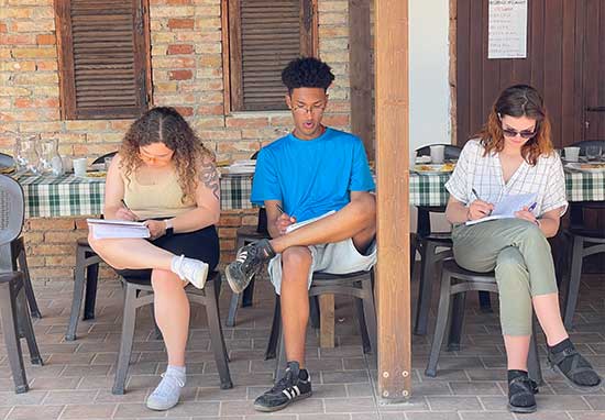 group of people taking notes