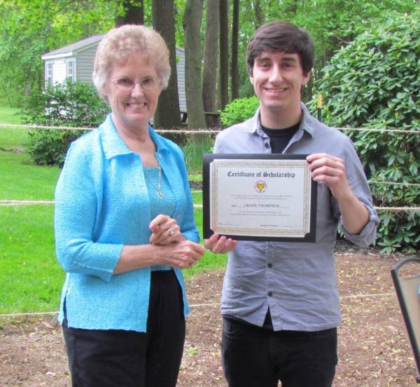 Student receiving a scholarship from donor Sandie Mather
