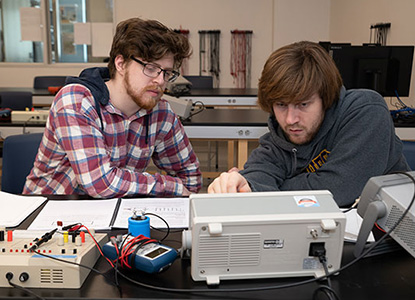 Physics Students working on Project